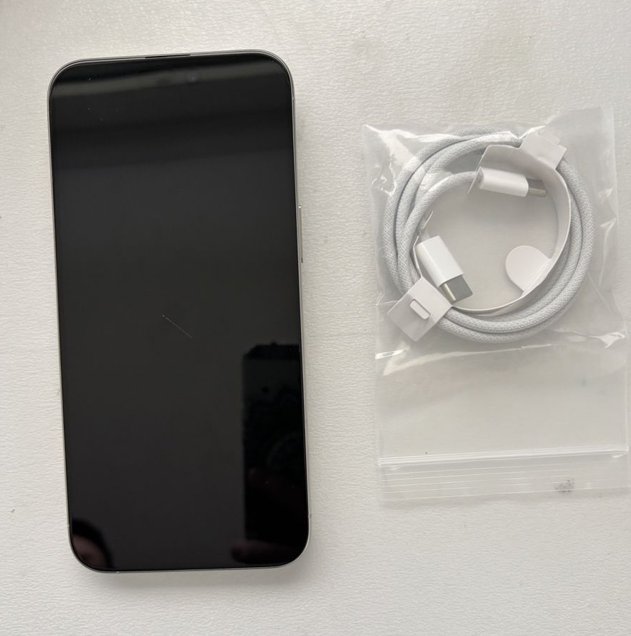 A Rephone device supplied with its charging cable